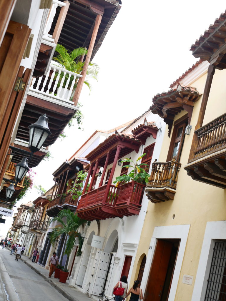 Various coloured buildings with balconies