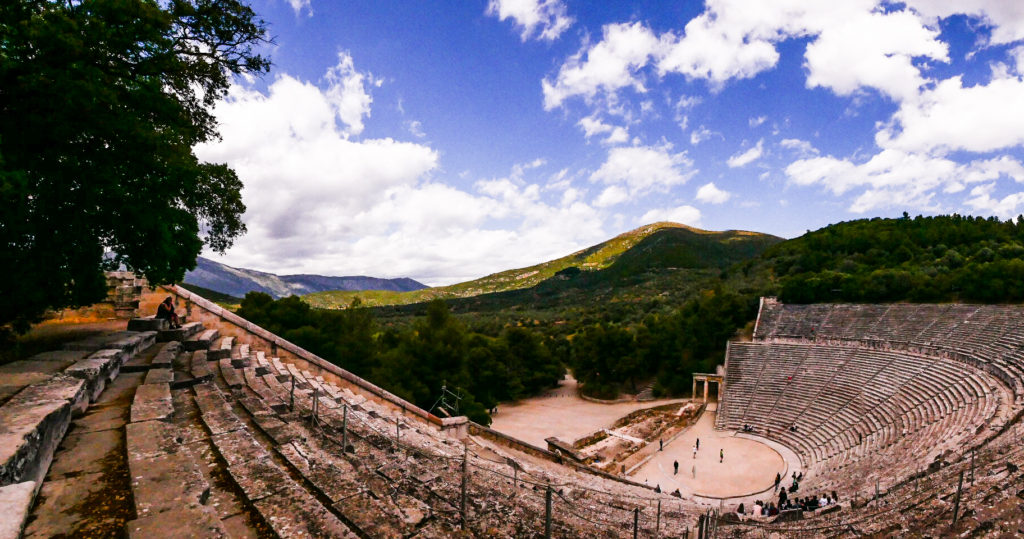 Ancient Theatre of Epidaurus with mountains in the background