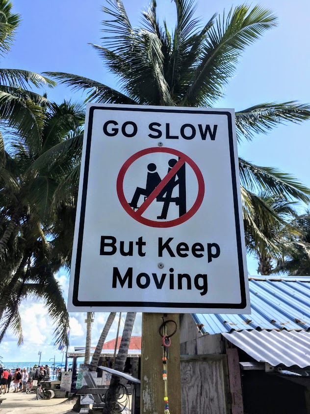 Road signs saying go slow